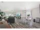 Living area with fireplace, dining table, and comfortable seating with lots of light at 2650 60Th N Ave, St Petersburg, FL 33714