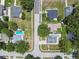 Well-maintained homes feature backyard retreats, surrounded by lush trees and landscaping in a peaceful neighborhood setting at 2692 Cedarbrooke Dr, Palm Harbor, FL 34684