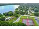 Community offers a lake, pool, playground, and tennis courts nestled among mature trees for outdoor enjoyment at 2692 Cedarbrooke Dr, Palm Harbor, FL 34684