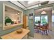 Bright kitchen with a pass-through to the dining area, enhancing the open and airy feel of the home at 304 Fowling Ct # A, Sun City Center, FL 33573