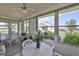 Enclosed patio with ample seating, offering a comfortable outdoor living space at 304 Fowling Ct # A, Sun City Center, FL 33573