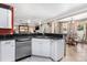 Spacious open concept kitchen with bar and an adjoining dining area at 30703 San An Rd, San Antonio, FL 33576