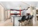 Modern kitchen with stainless steel appliances, a breakfast bar, and ample cabinet space at 30703 San An Rd, San Antonio, FL 33576
