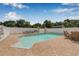 Backyard pool featuring classic columns and a well maintained deck for entertaining at 30703 San An Rd, San Antonio, FL 33576