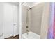 Clean bathroom showing a bathtub and shower with modern tile and fixtures at 3100 W Paul Ave # 14, Tampa, FL 33611