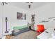 Bright home office with modern decor, a plush rug, a comfortable beanbag, and a functional workspace at 3100 W Paul Ave # 14, Tampa, FL 33611