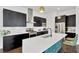 Stylish kitchen with a sleek island, stainless steel appliances, and contemporary finishes, perfect for cooking at 3100 W Paul Ave # 14, Tampa, FL 33611