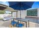 Outdoor patio area includes table and chairs, hot tub, and hammock at 3100 W Paul Ave # 14, Tampa, FL 33611