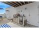 Outdoor patio boasts built-in grill and mini-fridge for outdoor entertaining at 3100 W Paul Ave # 14, Tampa, FL 33611