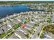 Aerial view of neighborhood highlighting proximity to large lake and community layout at 314 Blackrock Ln, Apollo Beach, FL 33572