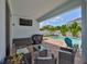 Inviting backyard with a pristine pool, lush landscaping, and a cozy seating area for outdoor enjoyment at 314 Blackrock Ln, Apollo Beach, FL 33572