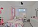 Charming bedroom boasts decor, with lots of natural light from the window at 314 Blackrock Ln, Apollo Beach, FL 33572
