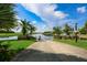 Community boat ramp and canal with clear skies offering direct access to the open water for boating and recreational activities at 314 Blackrock Ln, Apollo Beach, FL 33572