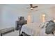 Bright main bedroom featuring a king bed, dark furniture, and great lighting at 314 Blackrock Ln, Apollo Beach, FL 33572