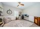 Office features a ceiling fan, natural light, and a workstation at 4222 Glade Wood Loop, New Port Richey, FL 34655