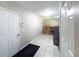 Well-organized laundry room equipped with modern washer and dryer, convenient storage, and a tiled floor at 4404 Hickory Branch Ct, Brandon, FL 33511