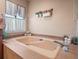 Soaking tub with neutral tile surround, perfect for relaxation at 4610 Westford Cir, Tampa, FL 33618