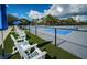 Outdoor pickleball courts with seating, offering a recreational space for residents and guests at 4736 Stonebriar Dr, Oldsmar, FL 34677