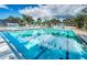 Bright and inviting outdoor pool with lounge chairs for relaxation and recreation at 4736 Stonebriar Dr, Oldsmar, FL 34677