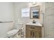 Bright bathroom featuring a stylish vanity, modern fixtures, and a walk-in shower at 5015 S 88Th St, Tampa, FL 33619