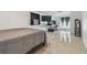 Bright bedroom with tile floors, TV, ample natural light, and modern decor at 5015 S 88Th St, Tampa, FL 33619