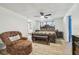 Bedroom showcasing a wooden bed frame with a decorative chair at 5015 S 88Th St, Tampa, FL 33619