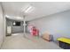 Bonus room with a gray interior, offering versatile space for various uses at 5015 S 88Th St, Tampa, FL 33619
