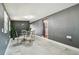 Inviting living room with dining space, natural light, and gray walls at 5015 S 88Th St, Tampa, FL 33619