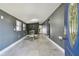 Inviting living room with dining space, natural light, and gray walls at 5015 S 88Th St, Tampa, FL 33619