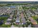 An expansive aerial perspective highlights the serene community lakes and neighborhood design at 509 Delwood Breck St, Ruskin, FL 33570