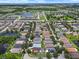 Expansive aerial view showcasing the well-distributed community lakes and neighborhood layout at 509 Delwood Breck St, Ruskin, FL 33570