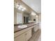 Bathroom boasts double sinks, granite countertops, and a large mirror at 509 Delwood Breck St, Ruskin, FL 33570