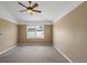 Bedroom featuring neutral walls, a ceiling fan, and a window for natural light at 509 Delwood Breck St, Ruskin, FL 33570