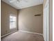 Empty bedroom with neutral walls, carpet flooring, ceiling fan, and closet, ready for personalization at 509 Delwood Breck St, Ruskin, FL 33570
