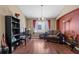 Cozy living room featuring hardwood floors and ample space for relaxation and entertaining at 509 Delwood Breck St, Ruskin, FL 33570