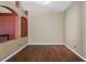 Spacious living room with hardwood floors, featuring an alcove and natural light at 509 Delwood Breck St, Ruskin, FL 33570