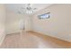 Bedroom with hardwood floors and a ceiling fan at 5309 Spectacular Bid Dr, Wesley Chapel, FL 33544