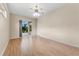 Bedroom with hardwood floors and ceiling fan at 5309 Spectacular Bid Dr, Wesley Chapel, FL 33544