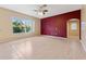 Open living room with hardwood floors and ceiling fan at 5309 Spectacular Bid Dr, Wesley Chapel, FL 33544