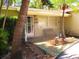 Inviting front porch with seating and a decorative pelican statue, framed by lush greenery at 5468 26Th N Ave, St Petersburg, FL 33710