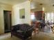 Open-concept living room leading to the kitchen and dining area, filled with natural light at 5468 26Th N Ave, St Petersburg, FL 33710