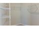 Walk-in closet with white wire shelving offers ample storage space at 720 Sky Shade Dr, Apollo Beach, FL 33572