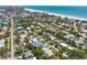 Stunning aerial view of a coastal neighborhood showcasing the proximity to beaches and ocean at 759 Lantana Ave, Clearwater Beach, FL 33767