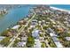 Scenic aerial shot of a neighborhood near the water, highlighting the lush greenery and coastal charm at 759 Lantana Ave, Clearwater Beach, FL 33767