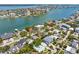 Overhead view captures the homes with a waterfront view in a beautiful, tropical setting at 759 Lantana Ave, Clearwater Beach, FL 33767