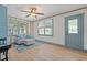 Bright living room with modern furnishings and an exterior door at 759 Lantana Ave, Clearwater Beach, FL 33767