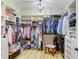 Spacious walk-in closet with custom shelving, storage solutions, and ample room for organization at 8605 Grand Alberato Rd, Tampa, FL 33647