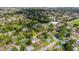 A broader aerial view of the property highlighting the surrounding neighborhood and streets at 915 S Miller Rd, Valrico, FL 33594