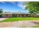 Charming single-story home with well-maintained lawn, plants, and inviting entrance at 915 S Miller Rd, Valrico, FL 33594