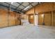 Spacious garage featuring open layout, bright lighting, and potential for versatile use at 915 S Miller Rd, Valrico, FL 33594